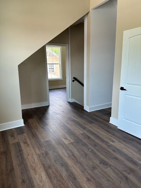 10267 Viola Road Morrison, TN 37357 - Photo 27 of 34 a view of an empty room with wooden floor and a window
