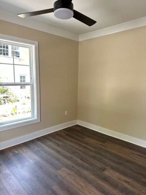 10267 Viola Road Morrison, TN 37357 - Photo 33 of 34 an empty room with wooden floor and windows