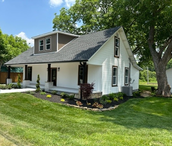 10267 Viola Road Morrison, TN 37357 - Photo 34 of 34 a front view of house with a garden and trees