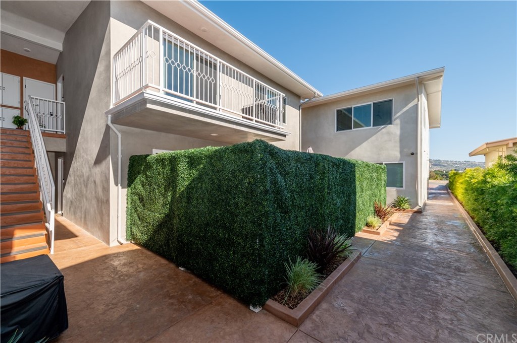 5 Clipper Road, Unit B Rancho Palos Verdes, CA 90275 - Photo 5 of 20 a front view of a house with a yard