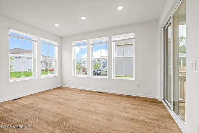 a living room with furniture or couch and a flat screen tv