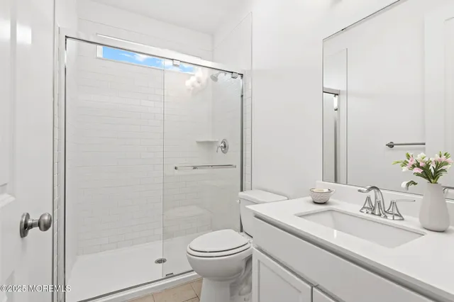 a view of staircase with white walls