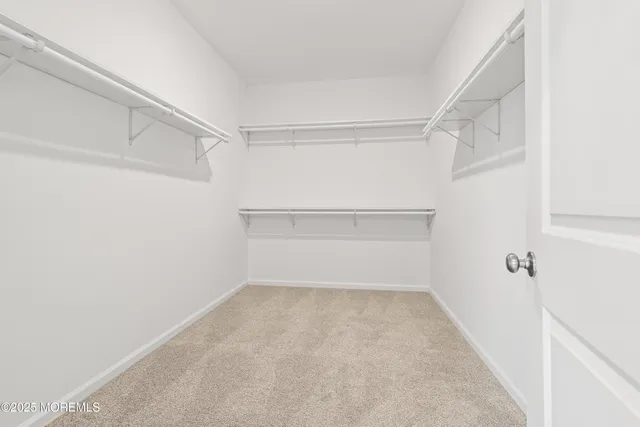 an empty room with an entryway