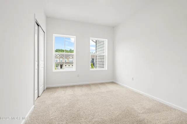 an empty room with a empty space and window