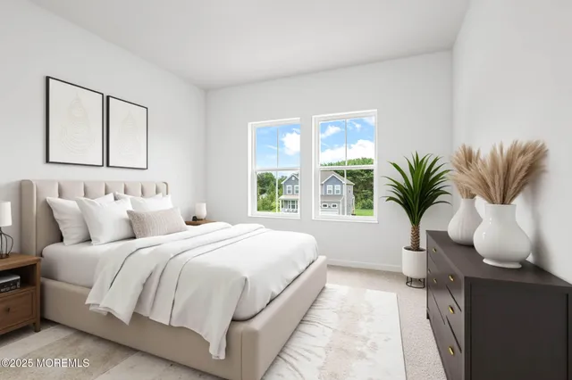 a bathroom with a sink toilet and mirror