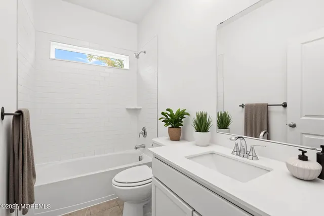 a view of a swimming pool with a patio and a garden