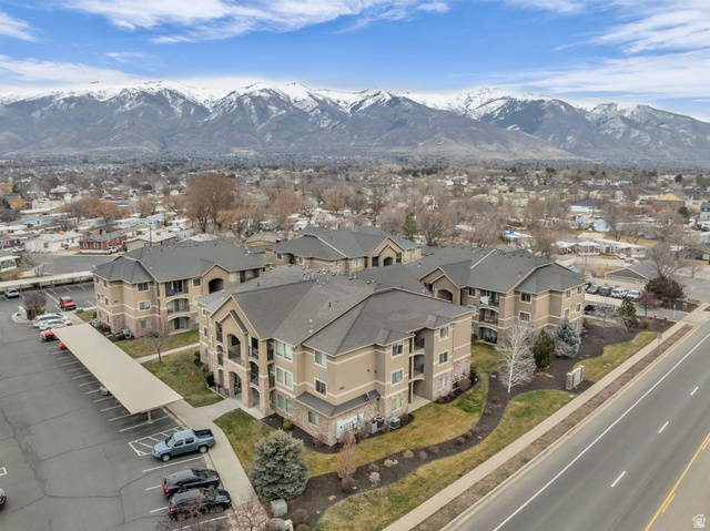 905 South Main Street, Unit G Layton, UT 84041 - Photo 24 of 36 Aerial view of residential area featuring mountains
