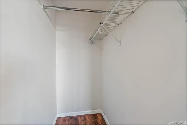 a view of a room with racks on the wall