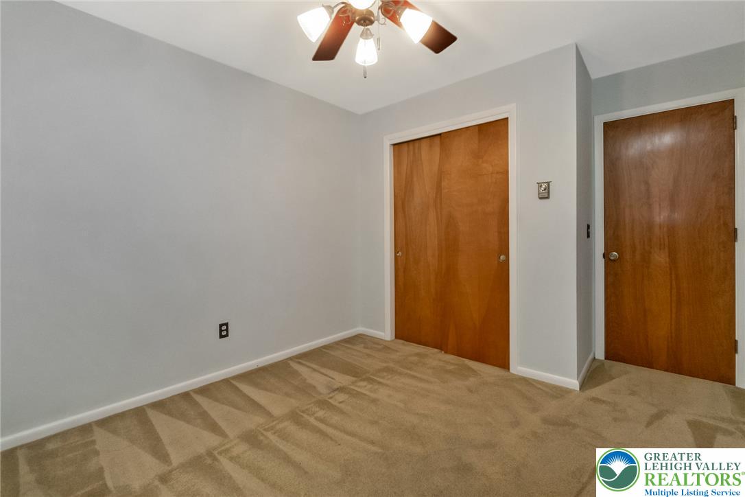1328 Russett Road Allentown, PA 18104 - Photo 24 of 46 A well-maintained bedroom offers comfort and a practical layout for relaxation and everyday living.