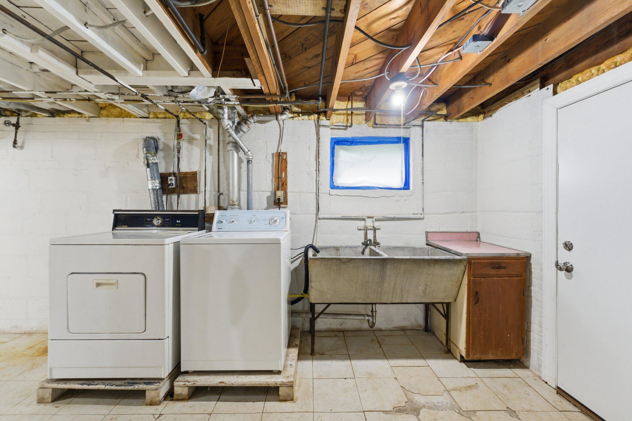 10143 Dallas Avenue Silver Spring, MD 20901 - Photo 41 of 49 Laundry Area + Utility Sink