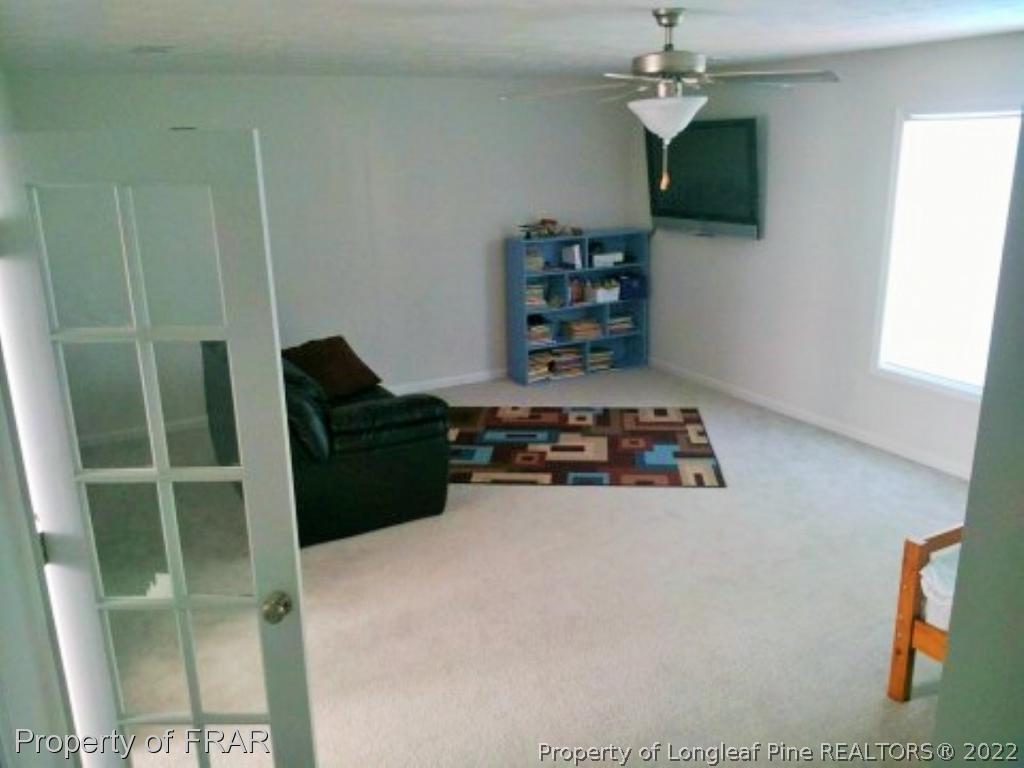 1149 Hoover Road Sanford, NC 27332 - Photo 12 of 15 a living room with furniture