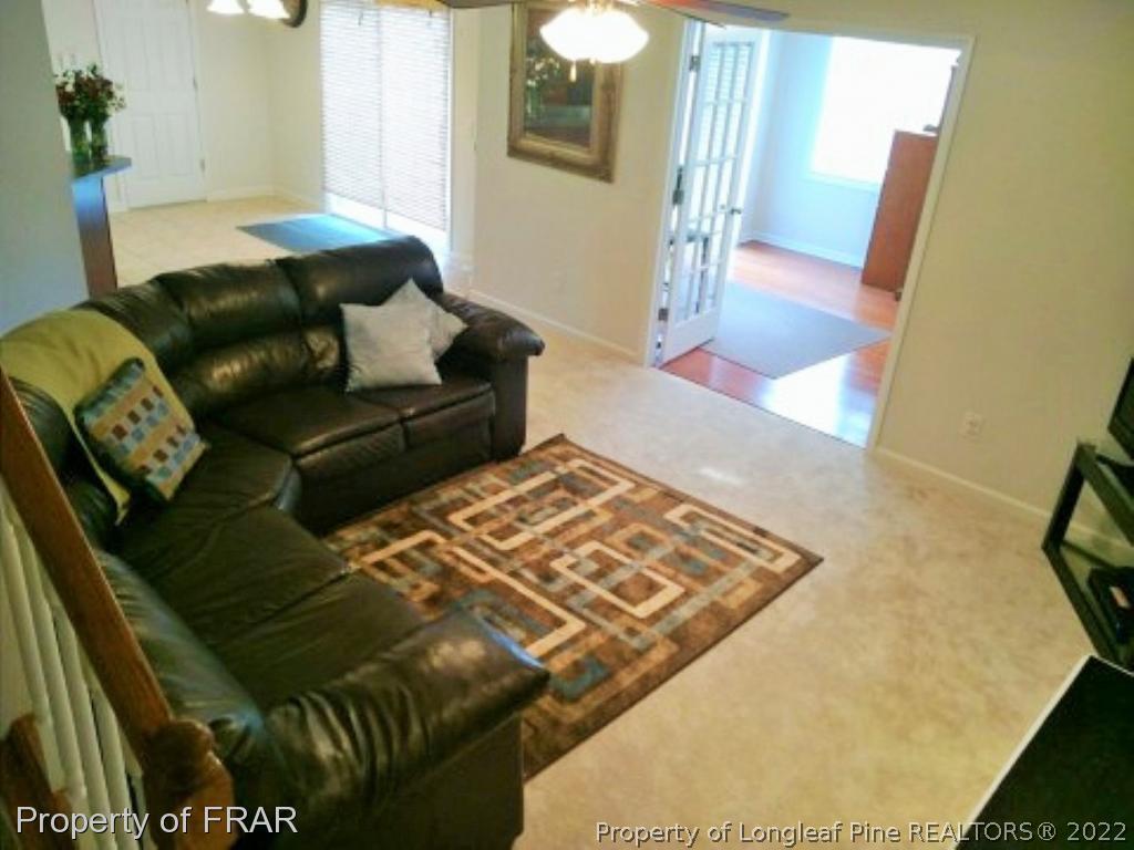 1149 Hoover Road Sanford, NC 27332 - Photo 8 of 15 a living room with a couch
