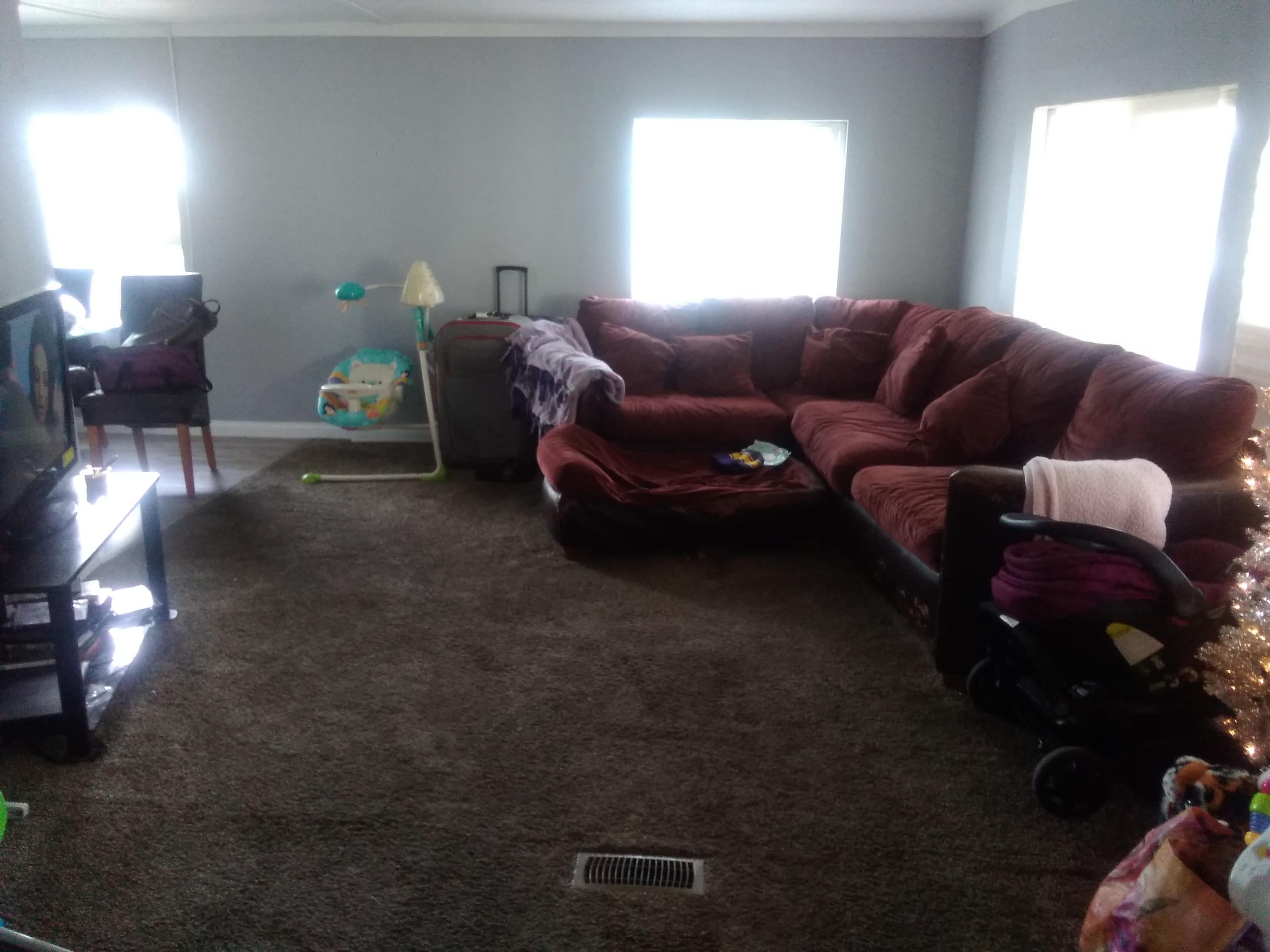 1855 East Riverside Drive Ontario, CA 91761 - Photo 4 of 13 a living room with furniture and a window
