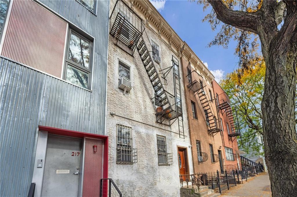 219 16th Street Brooklyn, NY 11215 - Photo 1 of 11 a view of a building with a tree