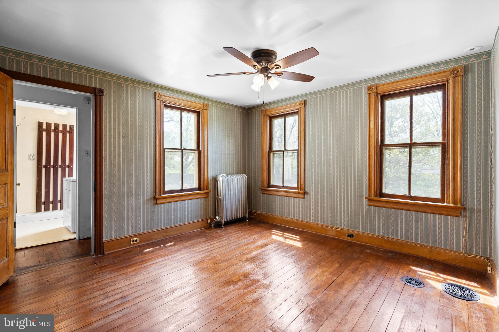 40 Barren Road Media, PA 19063 - Photo 15 of 30 a view of an empty room with wooden floor and a window