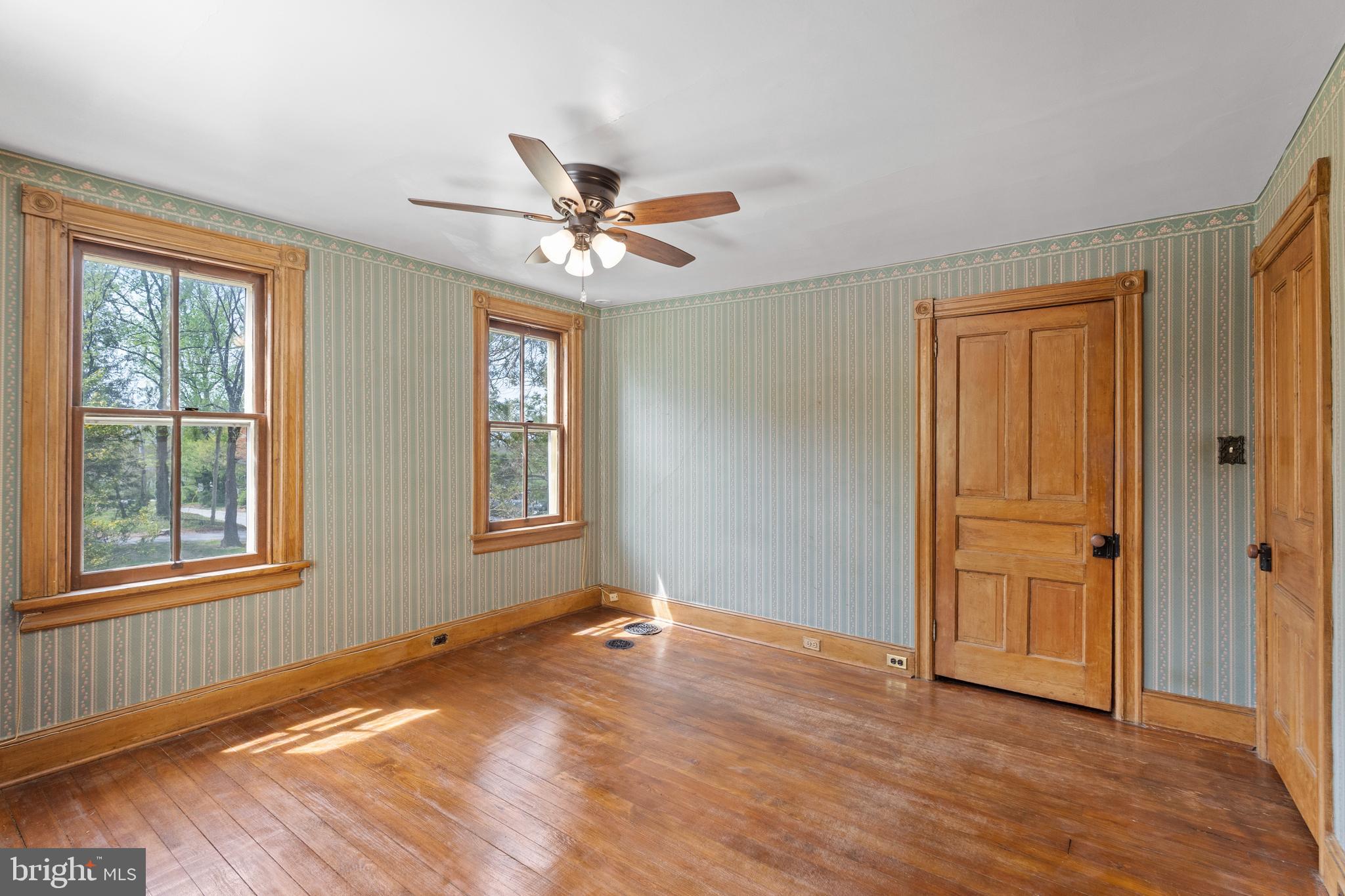 40 Barren Road Media, PA 19063 - Photo 16 of 30 a view of empty room with wooden floor and fan