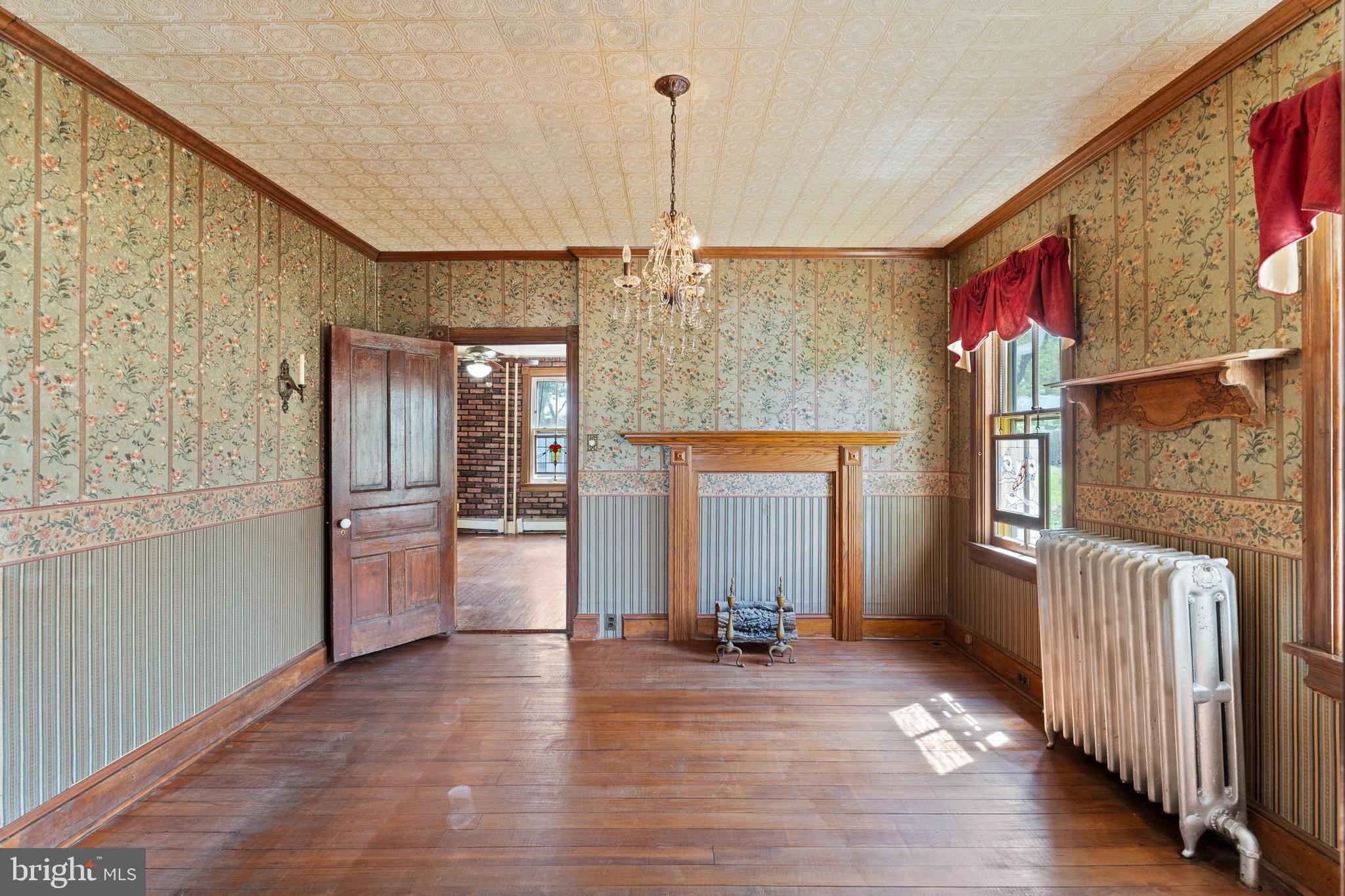 40 Barren Road Media, PA 19063 - Photo 22 of 30 a view of a hallway with wooden floor and windows