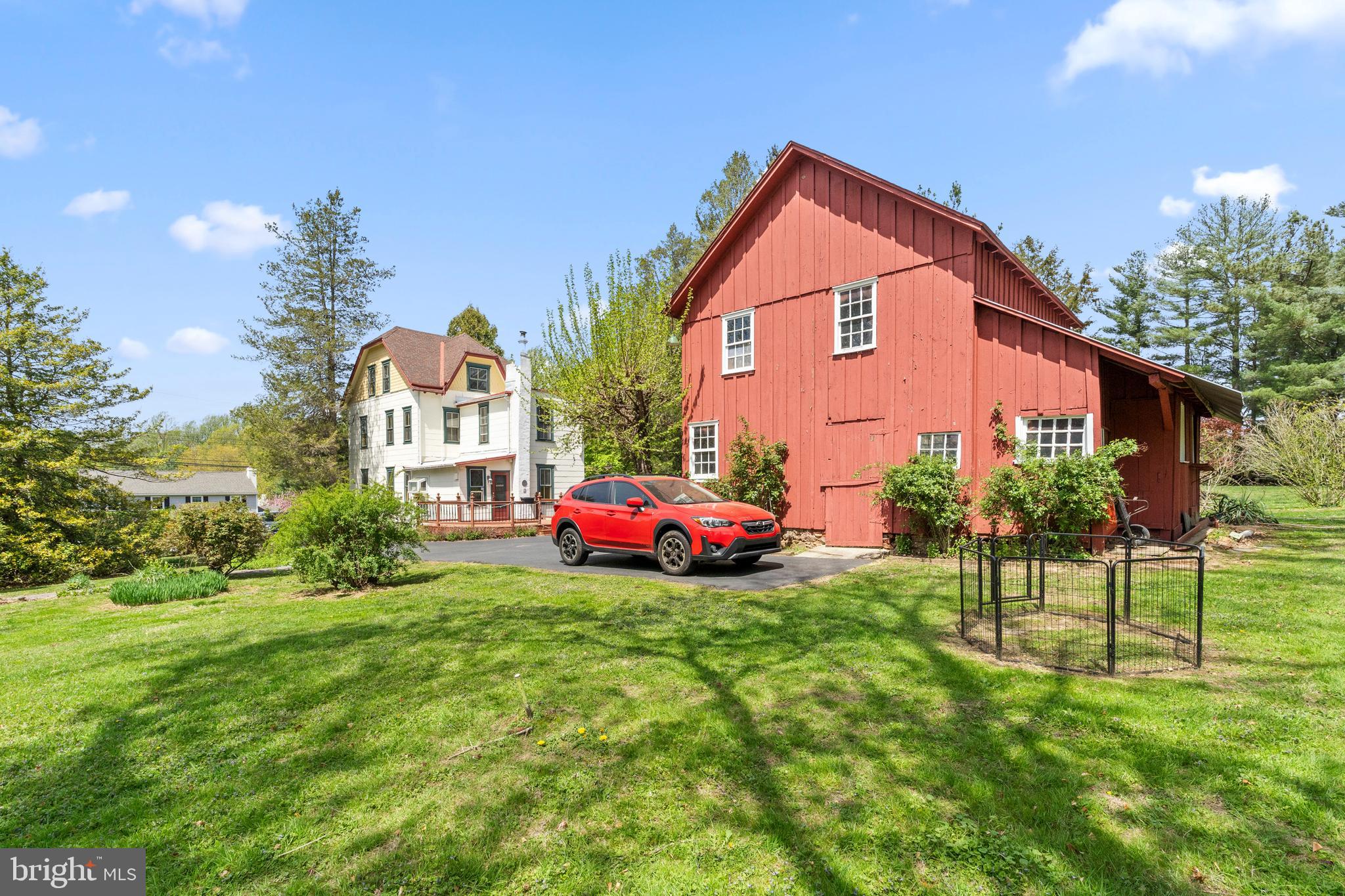40 Barren Road Media, PA 19063 - Photo 9 of 30 a front view of a house with a yard and garage