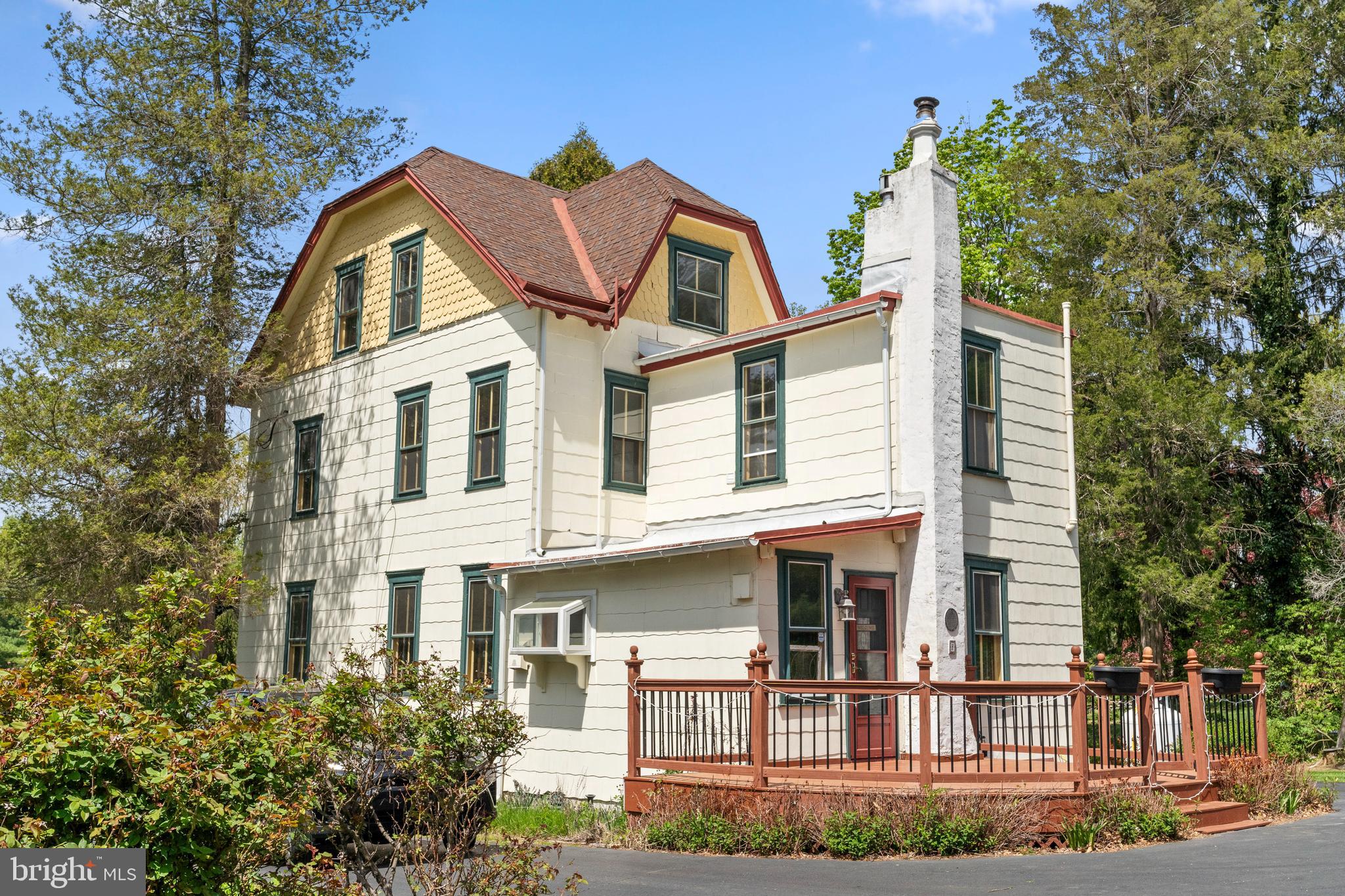 40 Barren Road Media, PA 19063 - Photo 10 of 30 a front view of a house with plants and trees