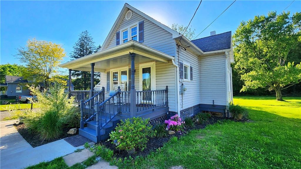 671 Old Rte 8 Harrisville, PA 16038 - Photo 5 of 49 a front view of house with garden