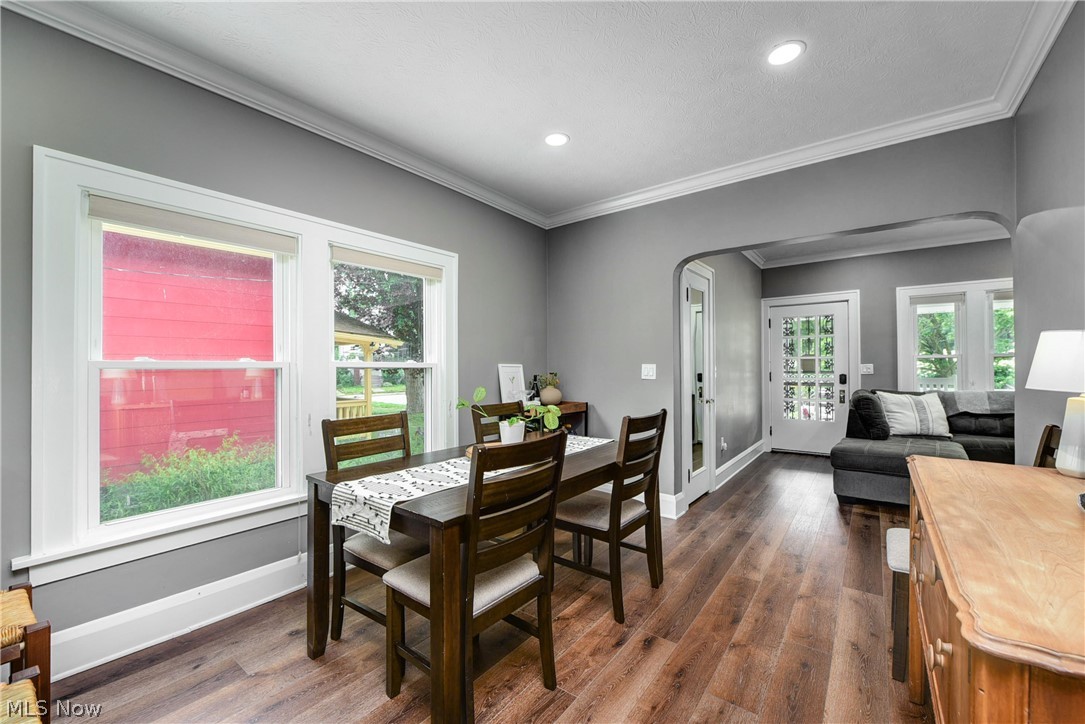 7408-7410 Rutledge Avenue Cleveland, OH 44102 - Photo 18 of 46 Dining area with dark hardwood / wood-style floors and ornamental molding