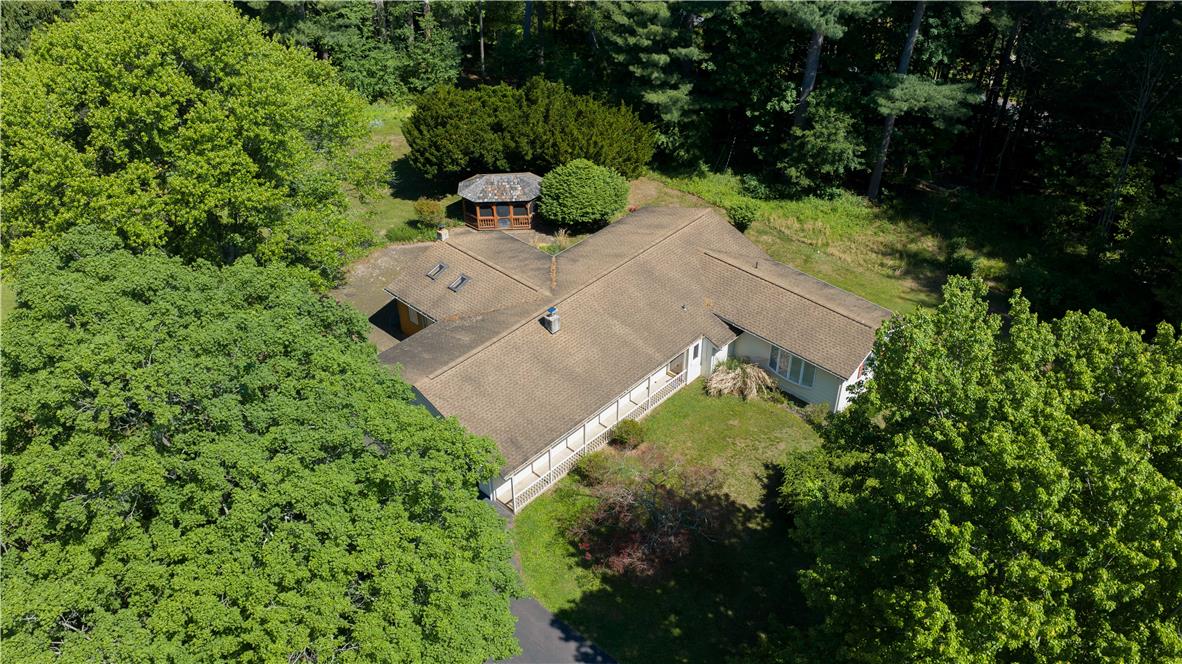 Coldsprings Rd Union Pottstown, PA 19465 - Photo 17 of 71 An aerial perspective reveals the expansive roofline of this secluded residence, nestled amongst abundant, verdant trees.