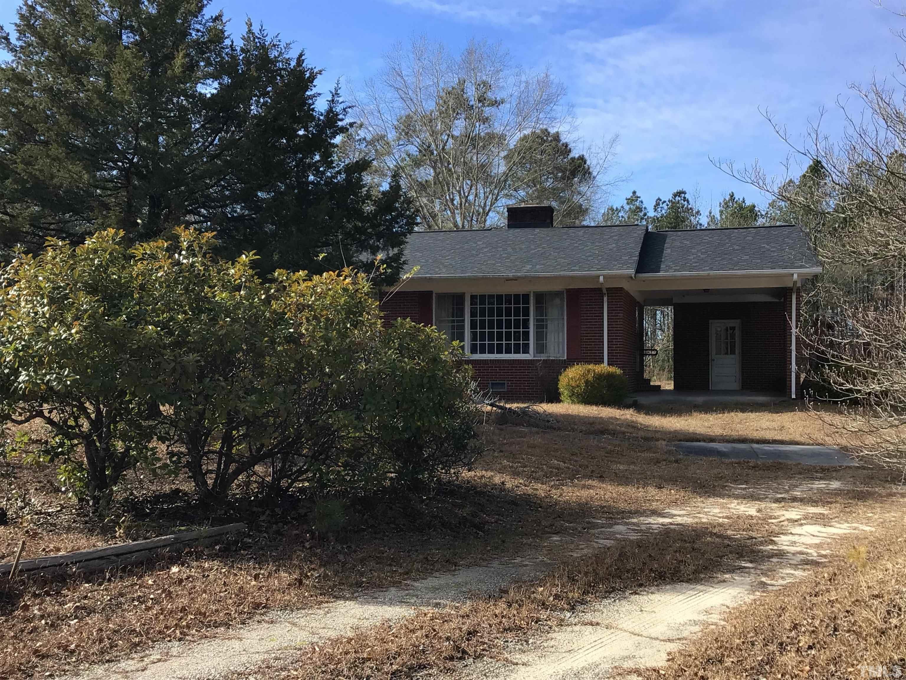 631 Cartledge Creek Road Rockingham, NC 28379 - Photo 38 of 74 a front view of a house with a yard