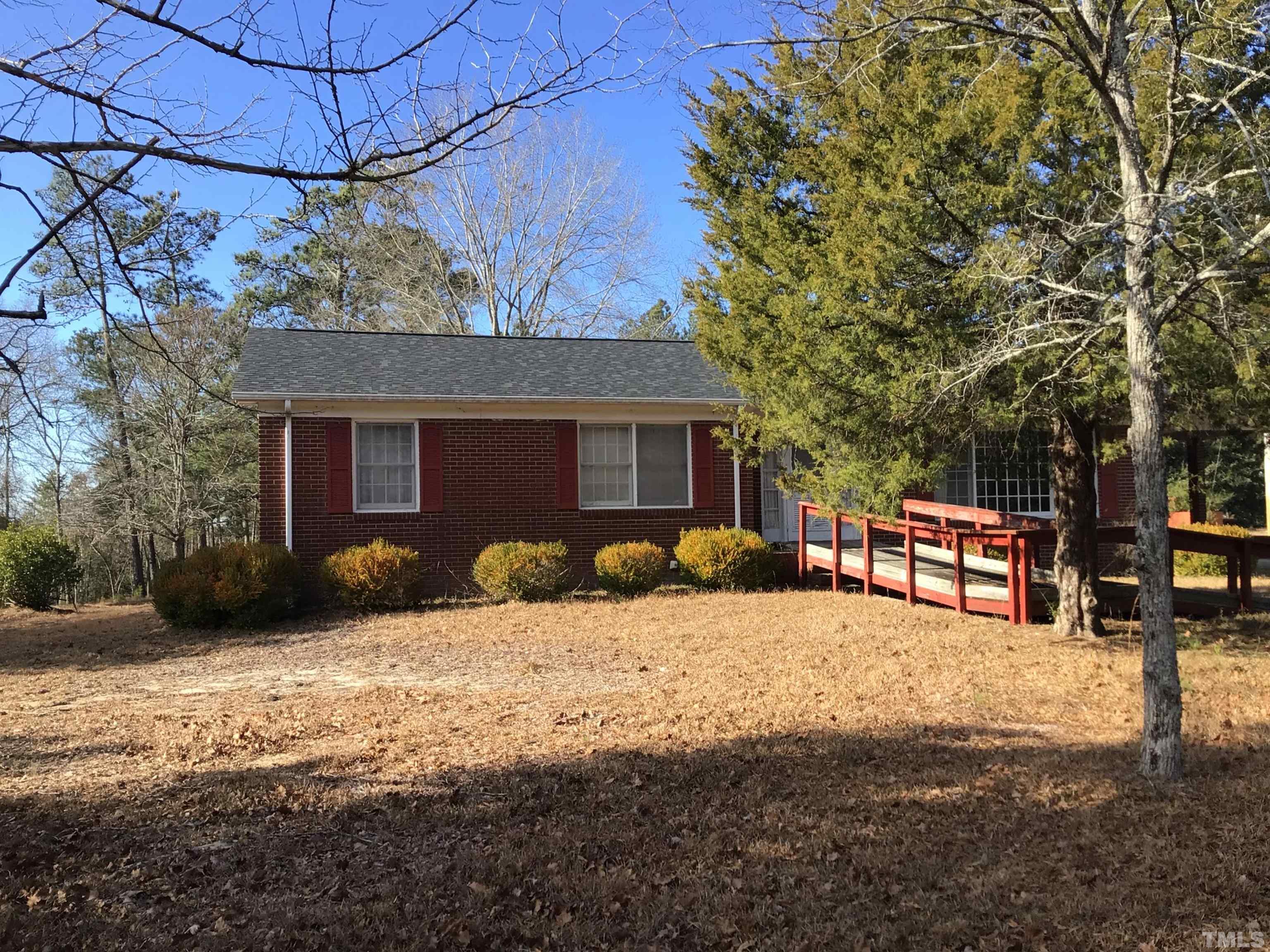 631 Cartledge Creek Road Rockingham, NC 28379 - Photo 49 of 74 a view of a house with a yard covered in snow