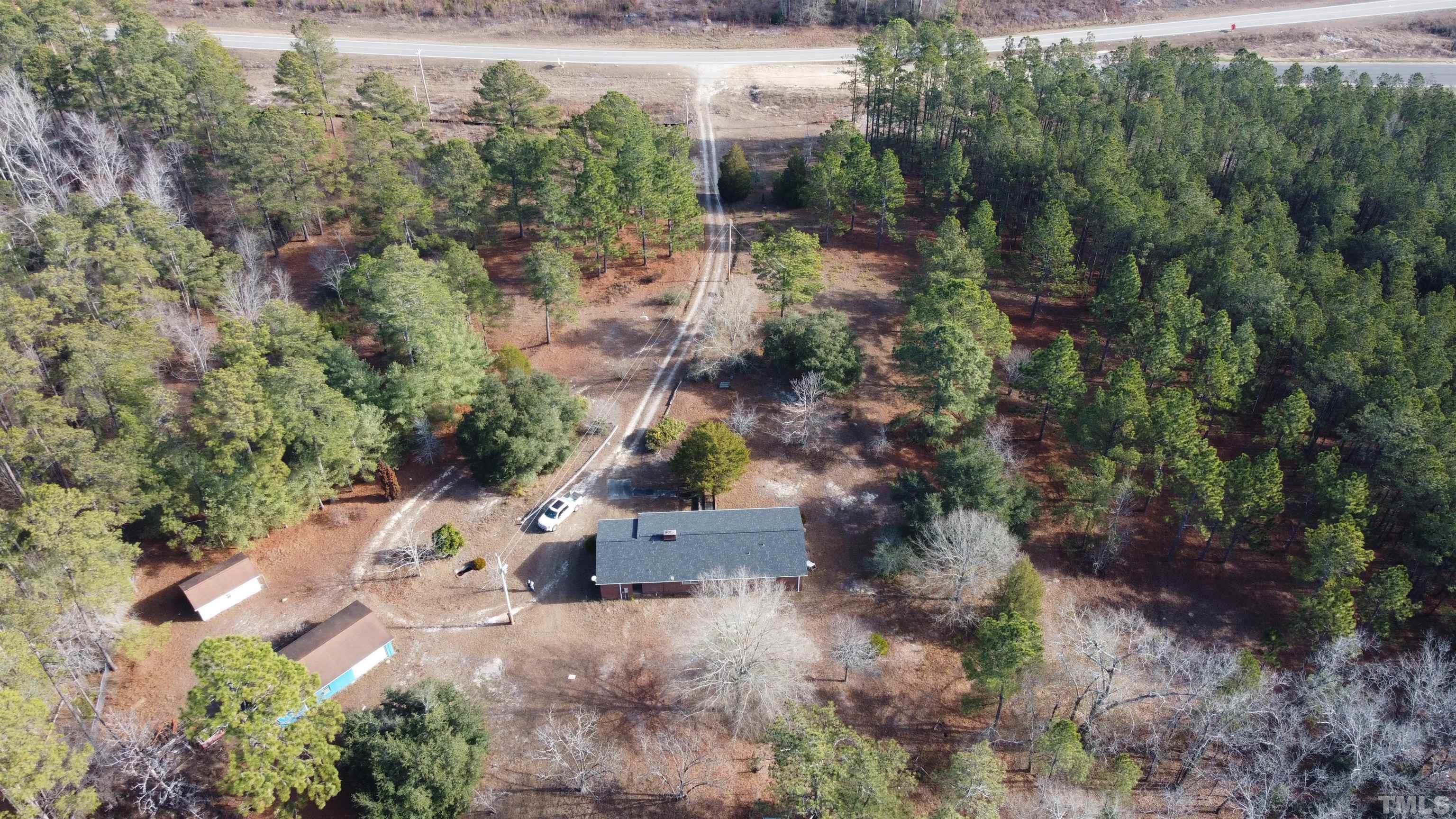 631 Cartledge Creek Road Rockingham, NC 28379 - Photo 5 of 74 an aerial view of residential house with outdoor space