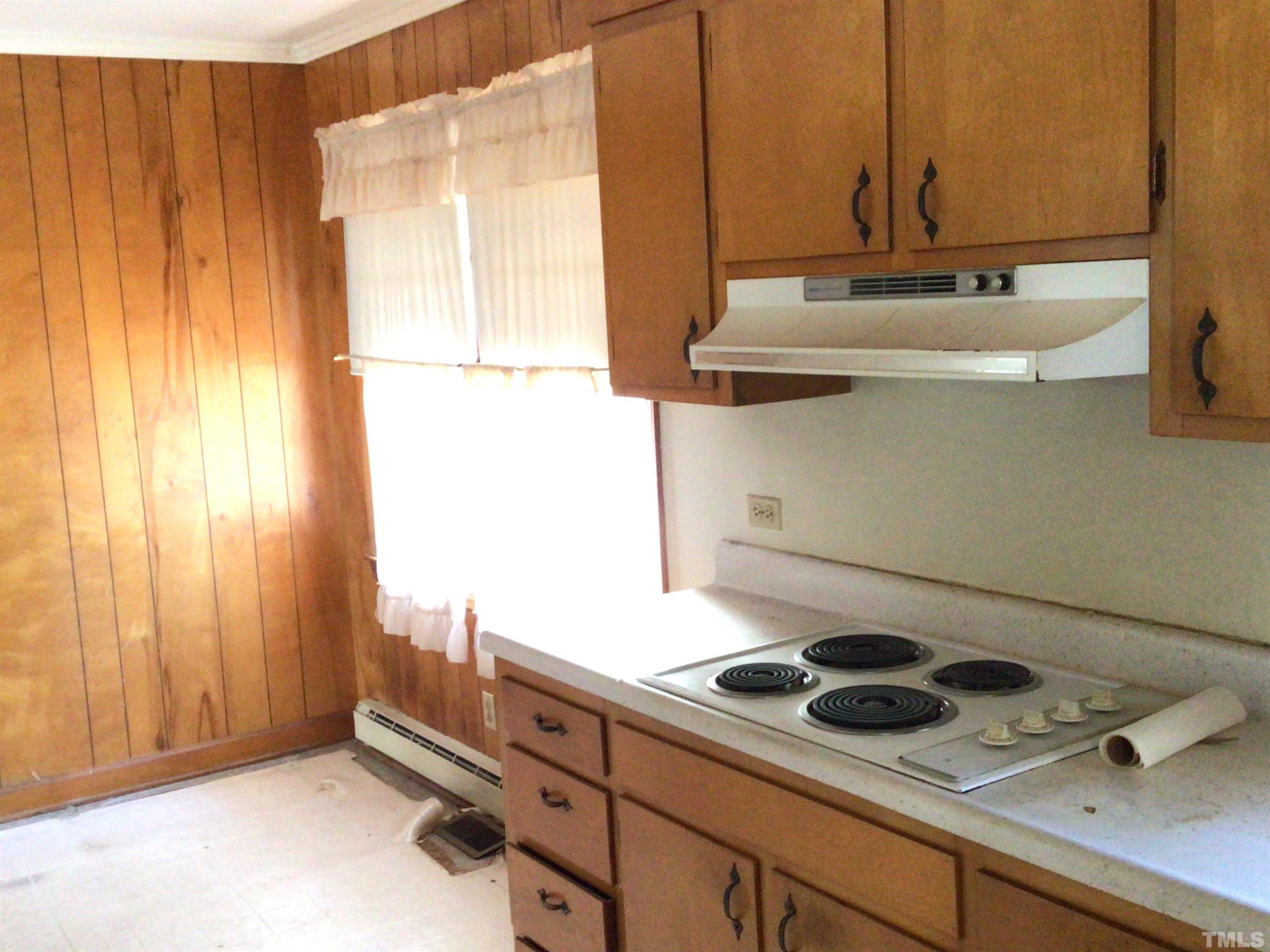 631 Cartledge Creek Road Rockingham, NC 28379 - Photo 68 of 74 a kitchen with a sink and a stove