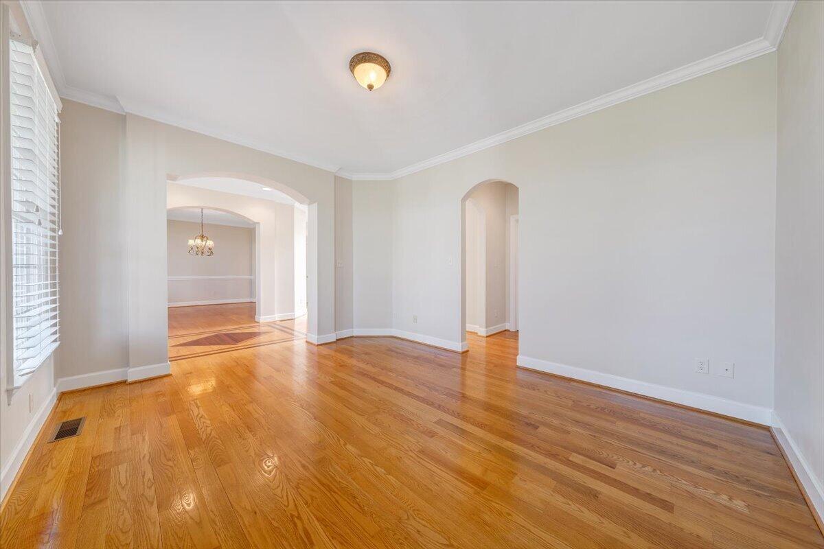 220 Settlers Road Fincastle, VA 24090 - Photo 14 of 106 a view of an empty room with wooden floor and a window