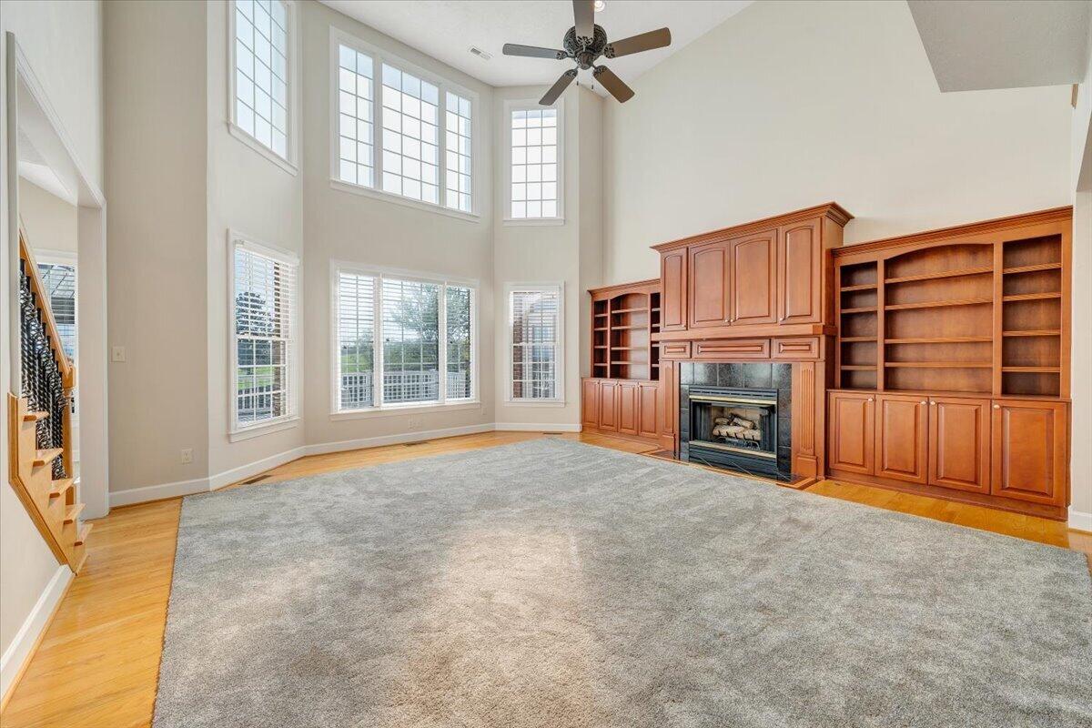 220 Settlers Road Fincastle, VA 24090 - Photo 18 of 106 a view of an empty room with a fireplace and a window