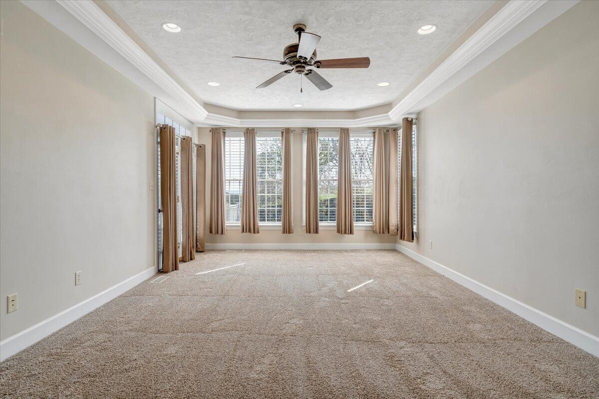 220 Settlers Road Fincastle, VA 24090 - Photo 37 of 106 a view of a room with a ceiling fan and window