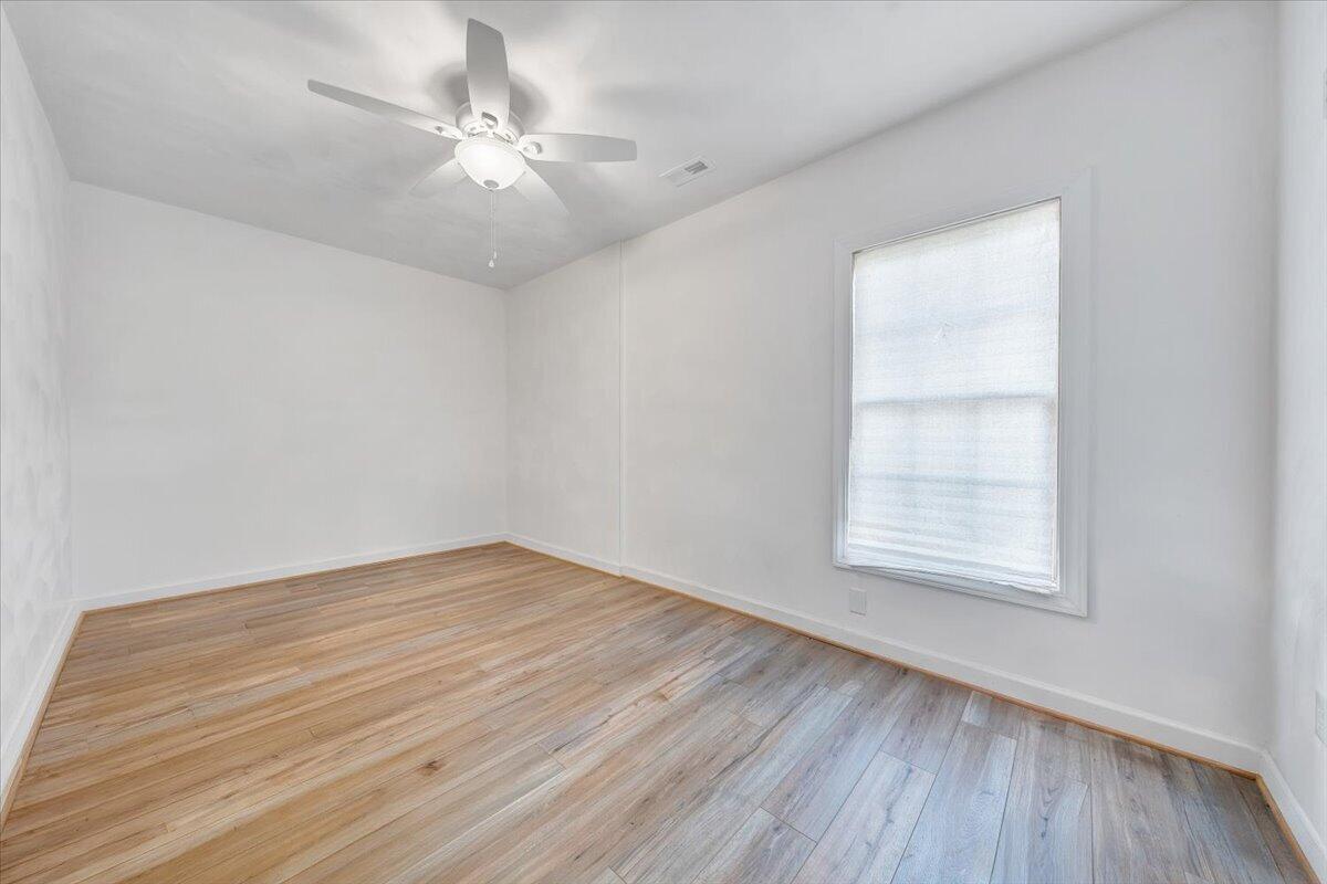 220 Settlers Road Fincastle, VA 24090 - Photo 73 of 106 wooden floor in an empty room with a window