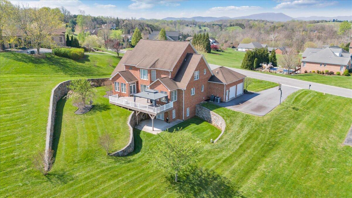 220 Settlers Road Fincastle, VA 24090 - Photo 9 of 106 an aerial view of a house with a big yard