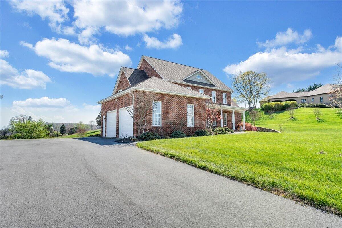 220 Settlers Road Fincastle, VA 24090 - Photo 92 of 106 a view of a house with a big yard plants and large trees