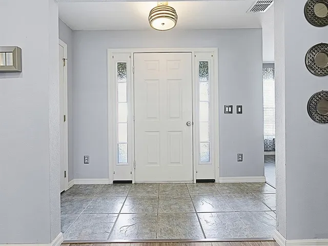 a view of a storage & utility room with a window