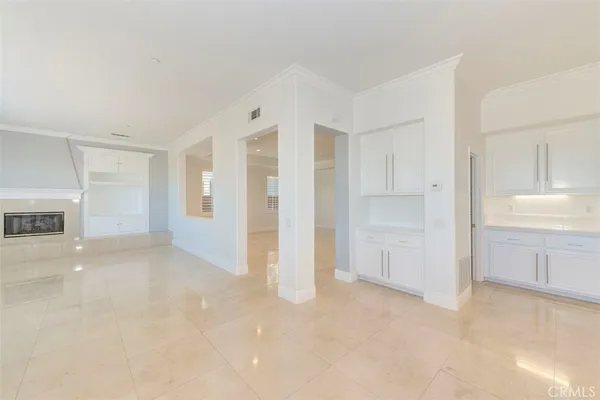 a bathroom with a double vanity sink and mirror