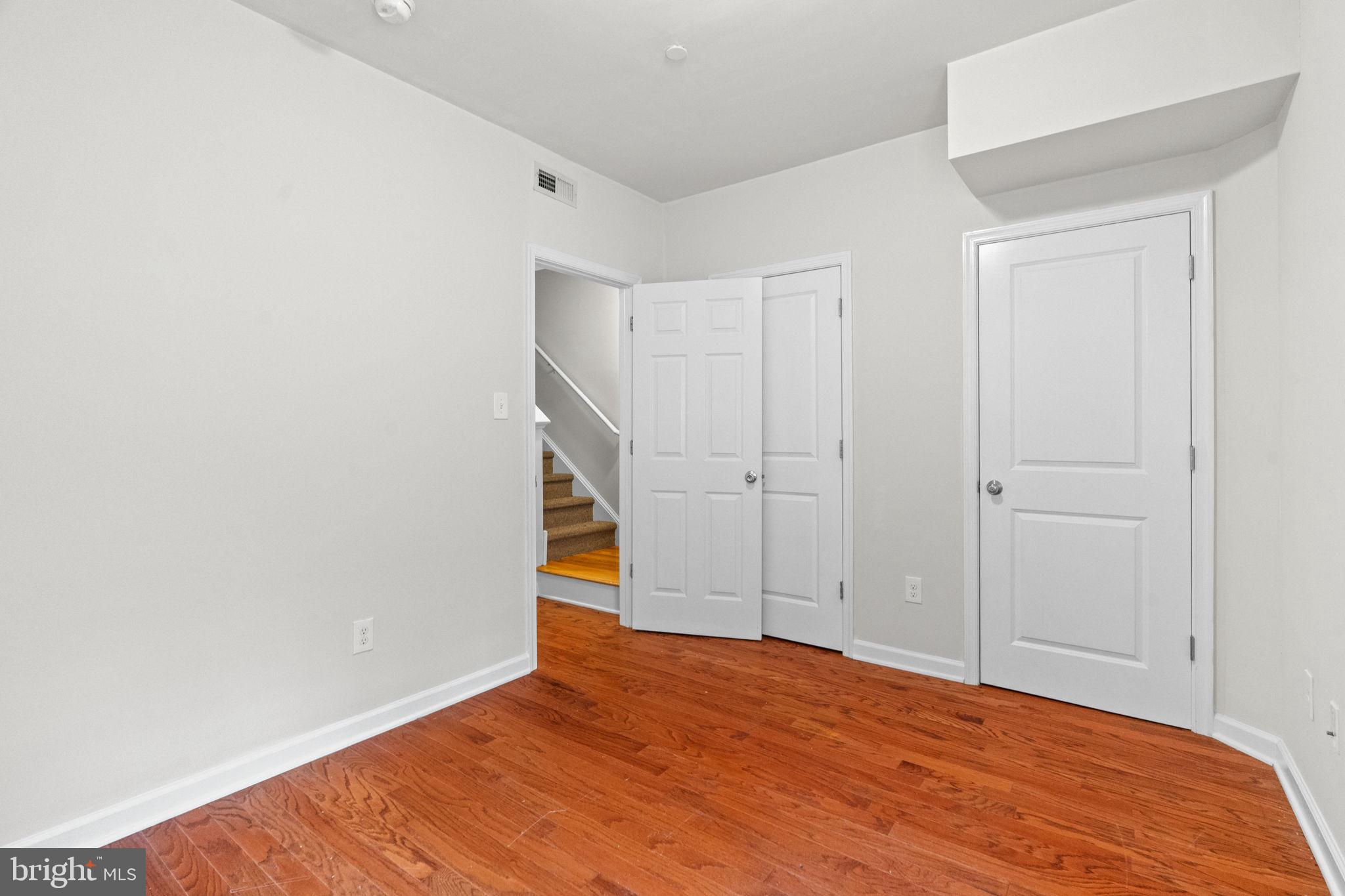 2106 North 17th Street Philadelphia, PA 19121 - Photo 25 of 84 a view of an empty room with wooden floor