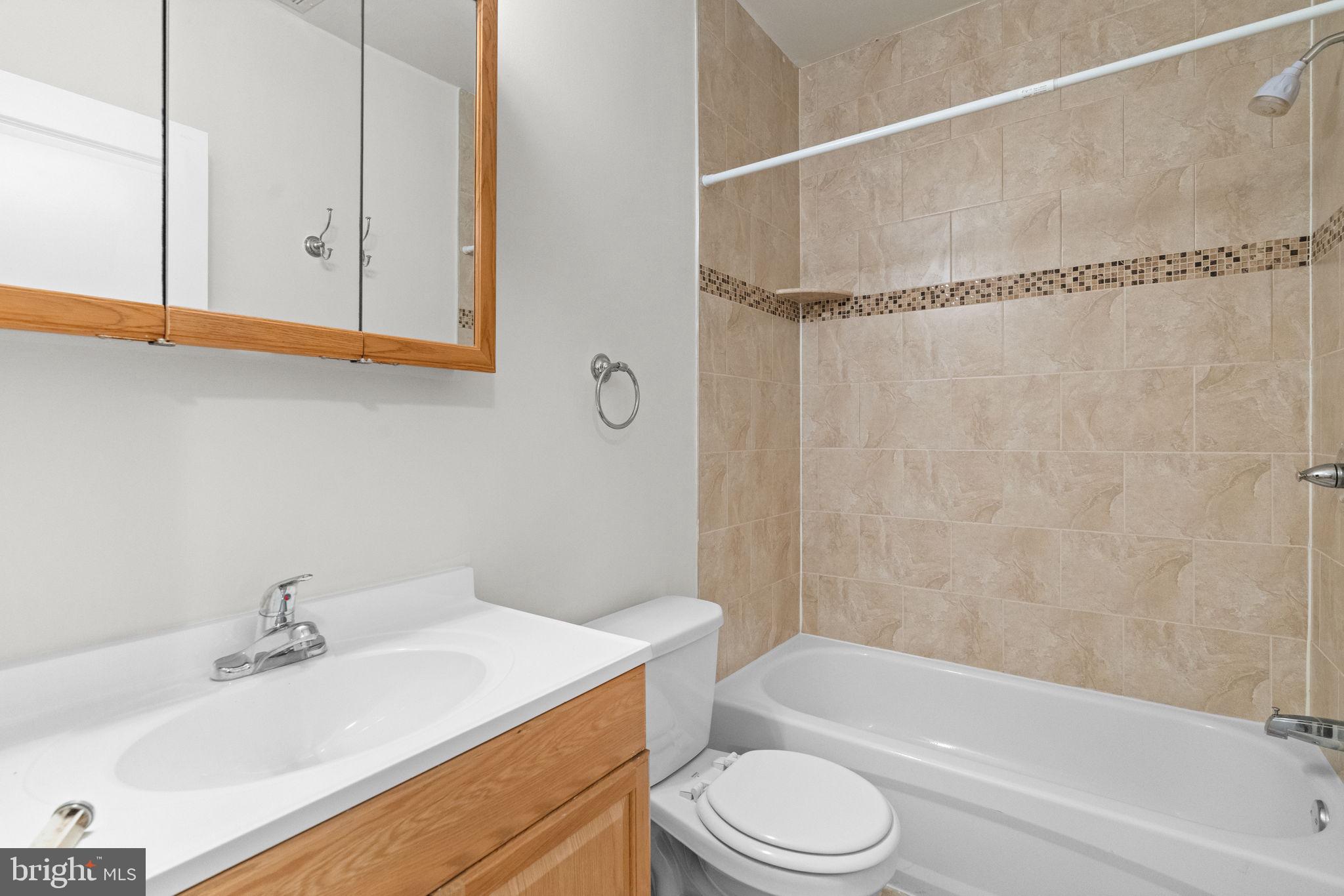 2106 North 17th Street Philadelphia, PA 19121 - Photo 27 of 84 a bathroom with a sink toilet and shower