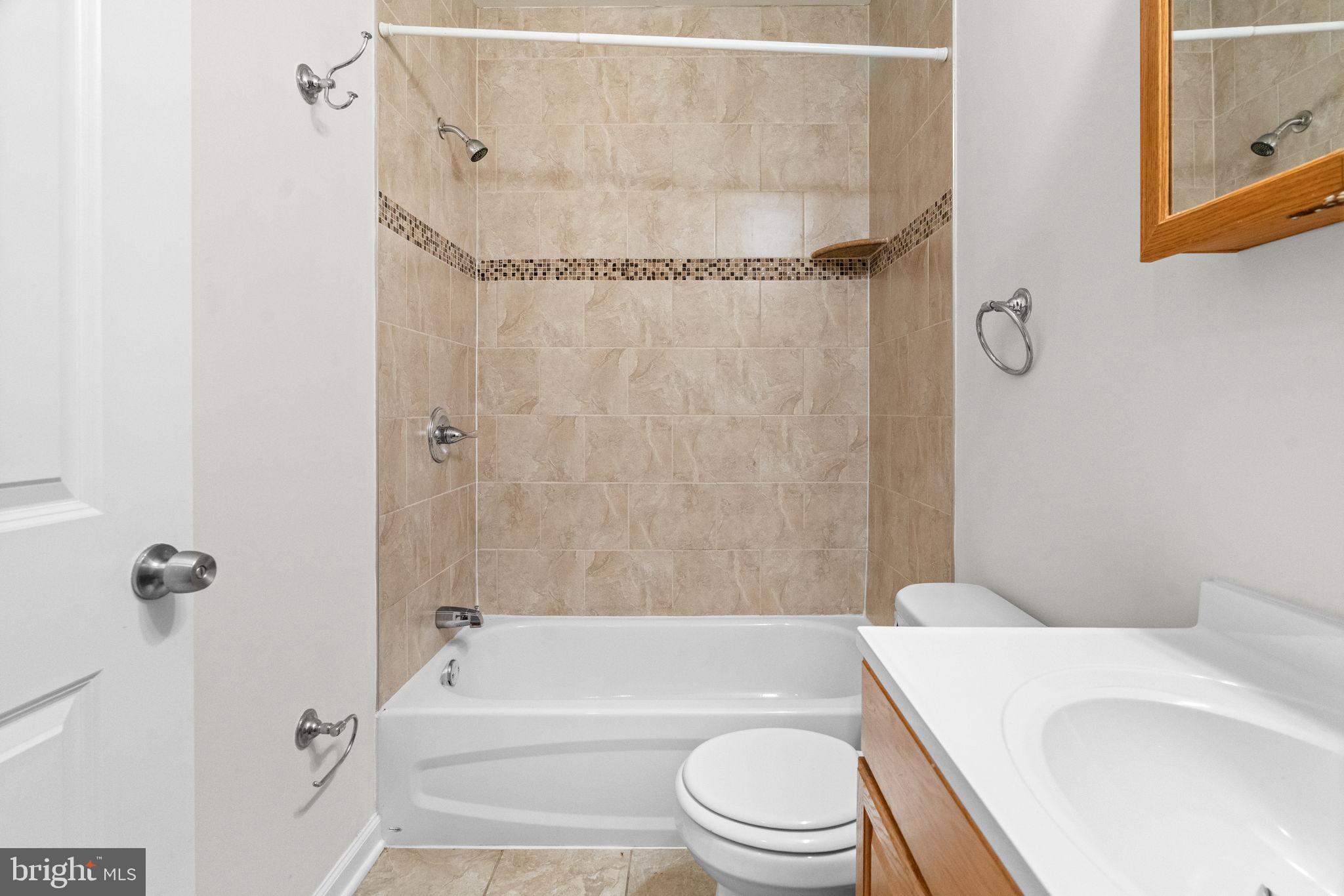 2106 North 17th Street Philadelphia, PA 19121 - Photo 37 of 84 a bathroom with a toilet and a bath tub