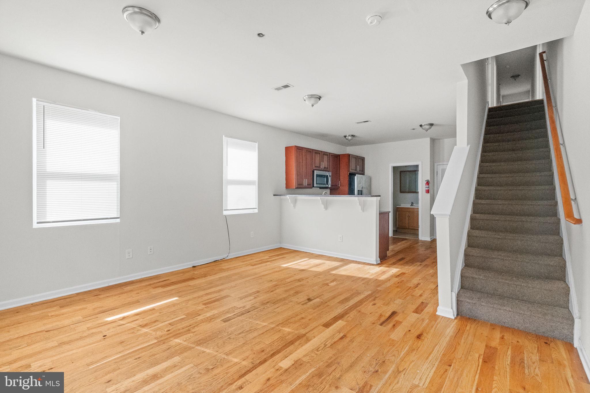 2106 North 17th Street Philadelphia, PA 19121 - Photo 54 of 84 a view of a room with wooden floor and stairs