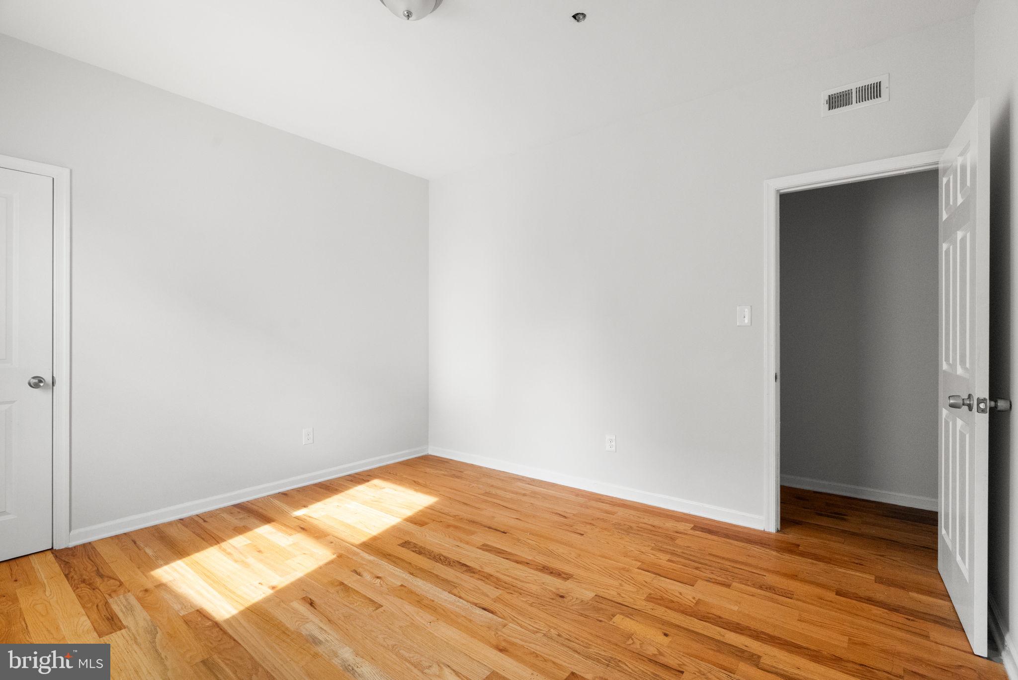 2106 North 17th Street Philadelphia, PA 19121 - Photo 57 of 84 a view of empty room with wooden floor
