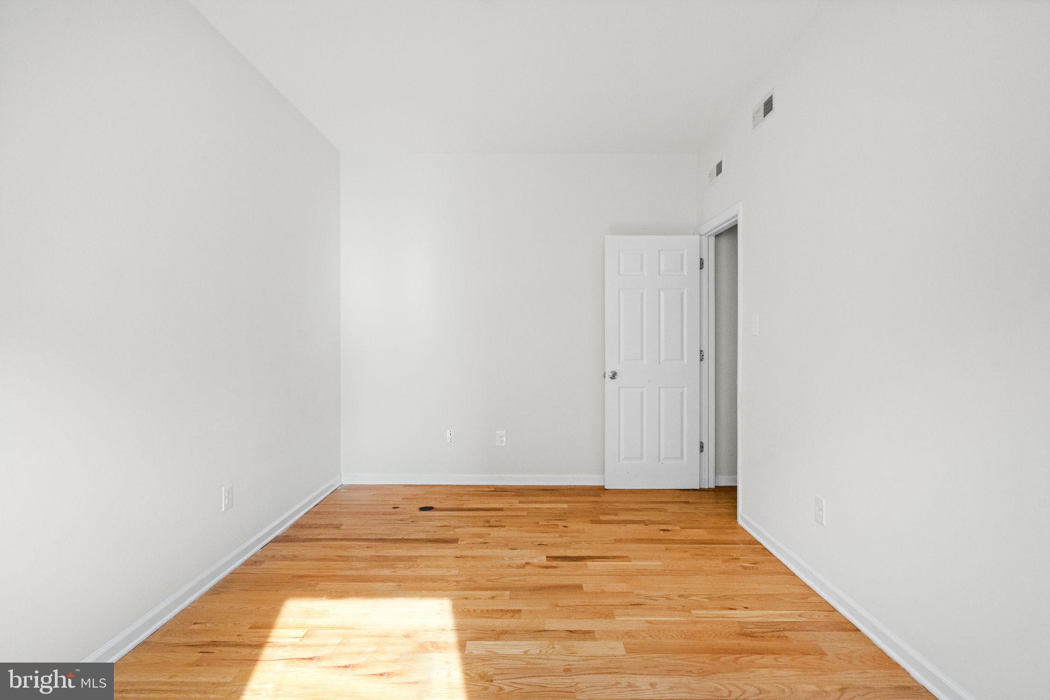 2106 North 17th Street Philadelphia, PA 19121 - Photo 64 of 84 a view of a room with wooden floor