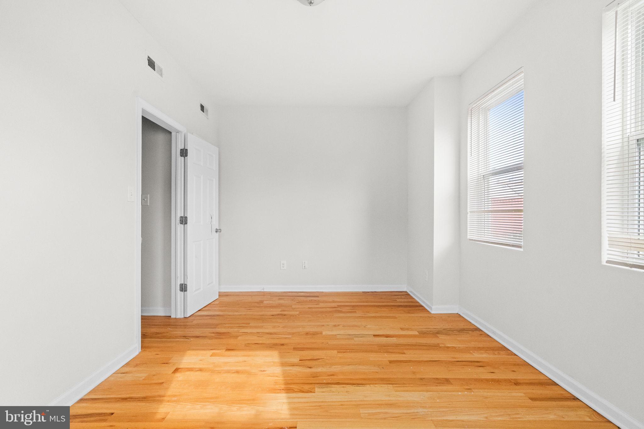 2106 North 17th Street Philadelphia, PA 19121 - Photo 74 of 84 a view of empty room with wooden floor