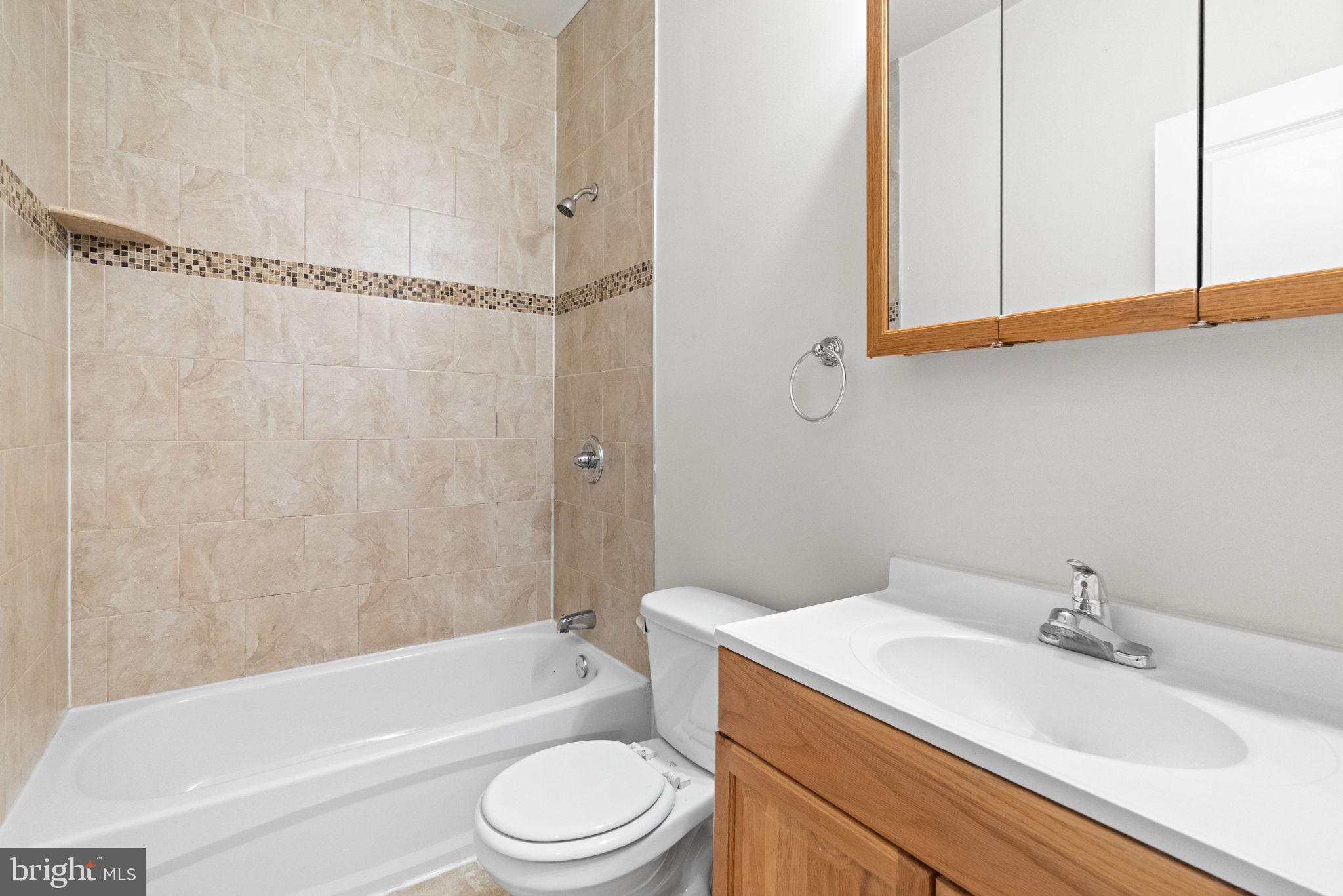 2106 North 17th Street Philadelphia, PA 19121 - Photo 8 of 84 a bathroom with a sink a toilet and shower