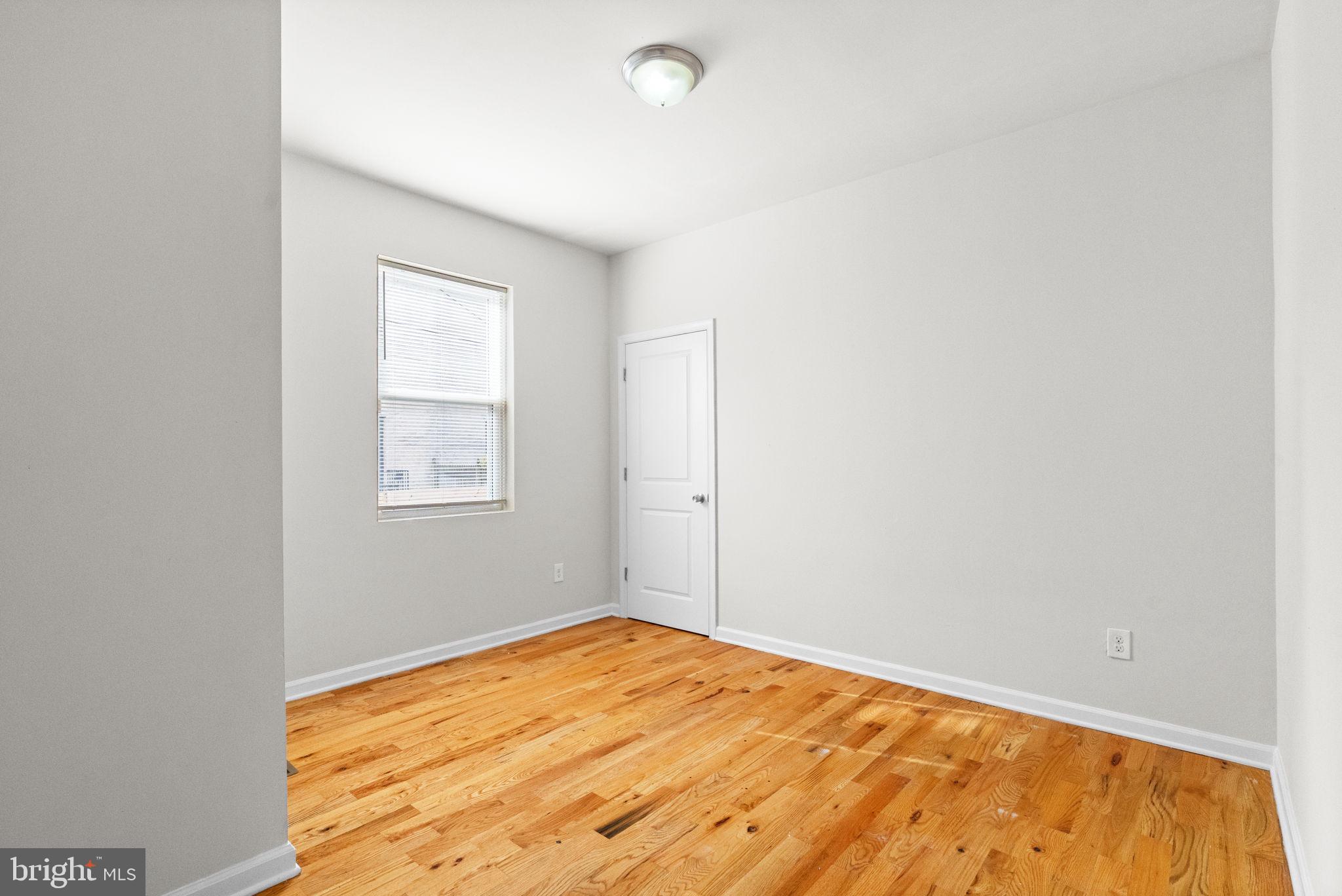 2106 North 17th Street Philadelphia, PA 19121 - Photo 9 of 84 an empty room with a window