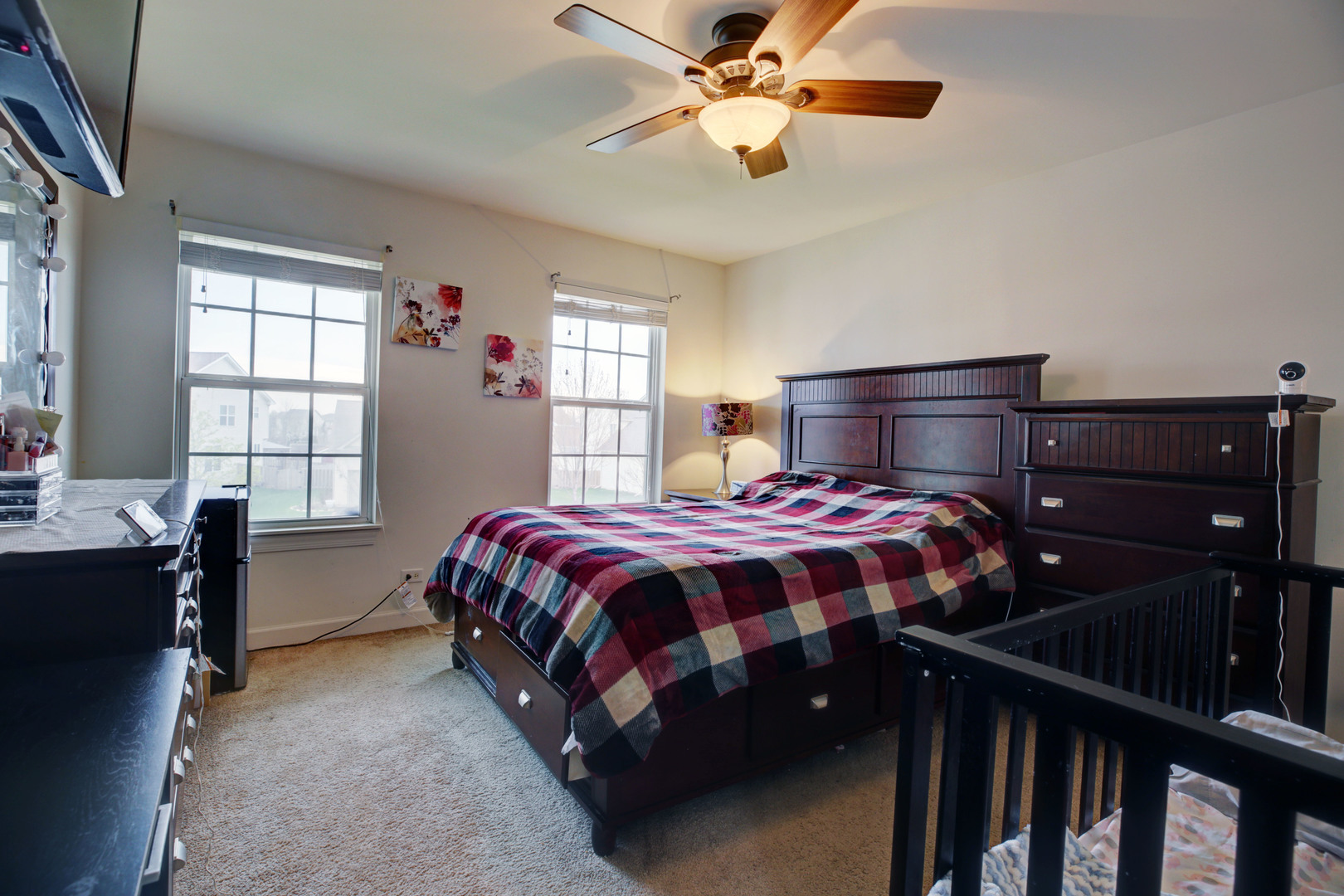 863 Oak Ridge Boulevard Elgin, IL 60120 - Photo 41 of 46 a bedroom with a bed and window