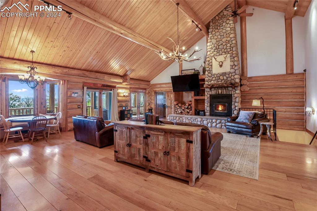 616 Summit Road Hartsel, CO 80449 - Photo 15 of 50 a living room with furniture and a fireplace