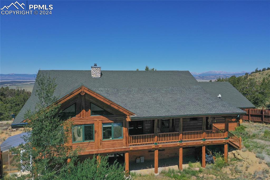 616 Summit Road Hartsel, CO 80449 - Photo 2 of 50 a front view of a house with a yard